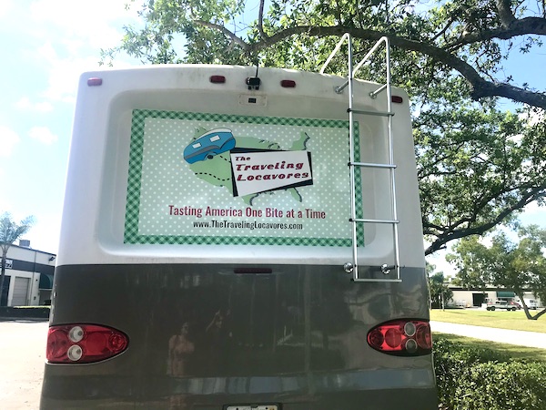 The rear of an RV with logo and graphics from Another RV Renovations Update