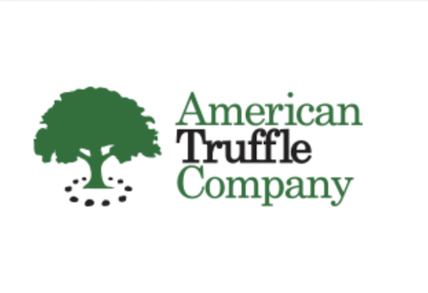 American Truffle Company Logo showing a tree surrounded by truffles at the base from First Burgundy Truffle Harvest in America