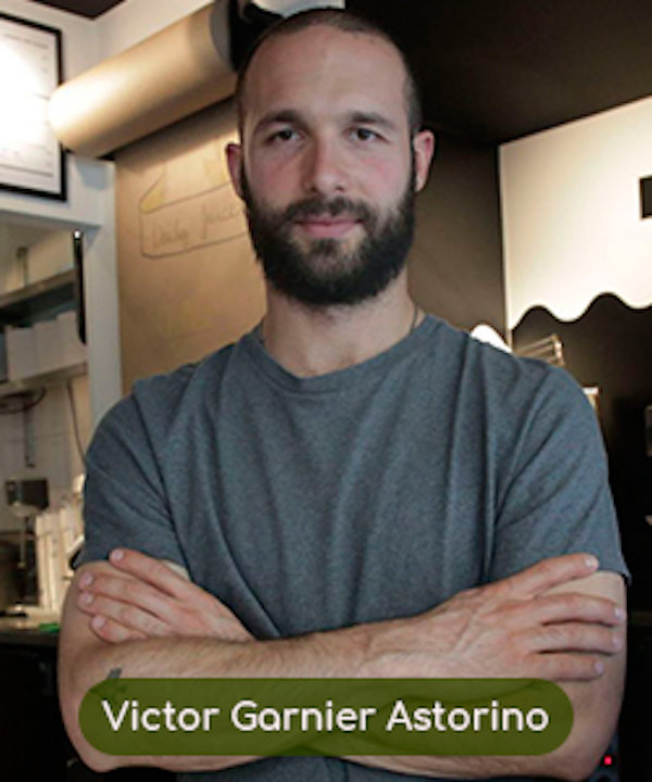 Bearded man in grey Tee shirt with arms crossed author of Los Angeles Cult Recipes