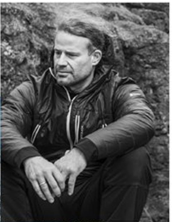 A black and white photo of a man from Taste the Wild