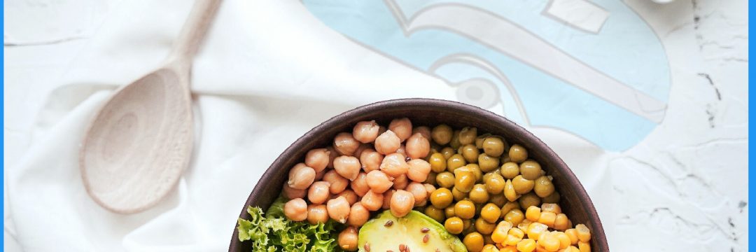 A bowl filled with vegetables and a variety of beans from Simple Tips for Eating Well