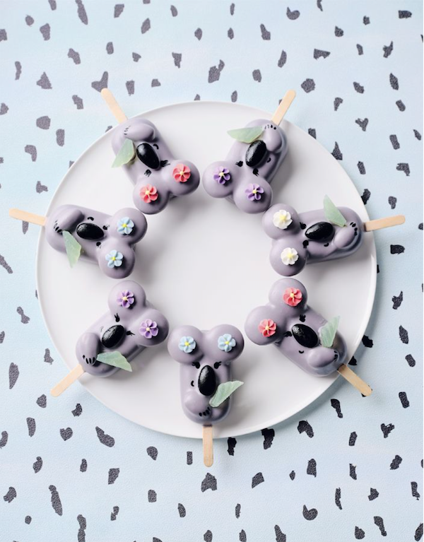 A circle of koala shaped cake pops on a white plate from Bake Australia Great