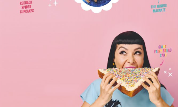 A woman taking a bite out of a big slice of cake from Bake Australia Great