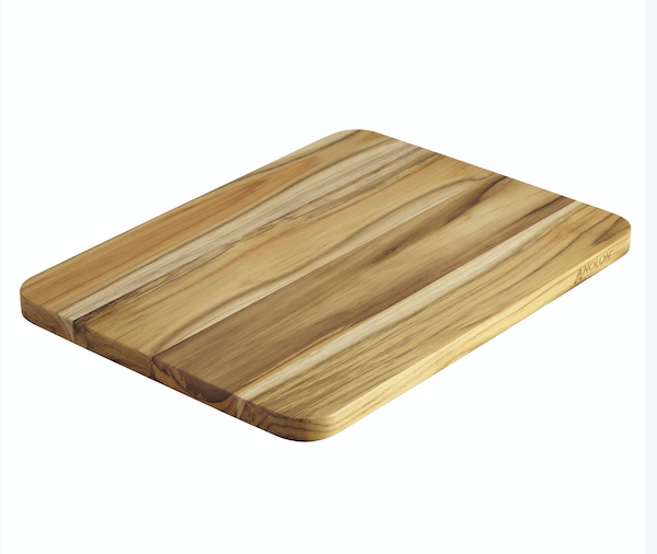 A rectangular teakwood cutting board from Father's Day Gifts for Dads Who Cook