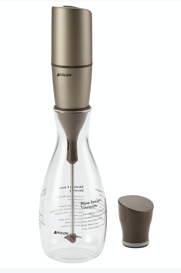 A glass bottle with gold topped mixer inside from Father's Day Gifts for Dads Who Cook
