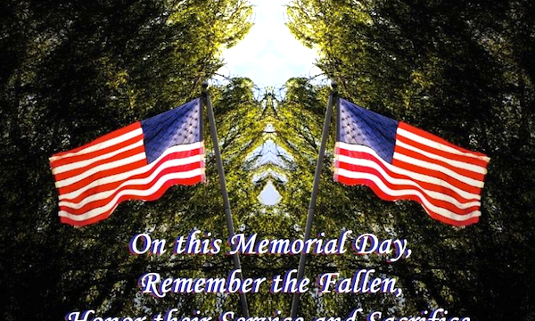Two American flags flying in front of trees and sky from Memorial Day Always Remember