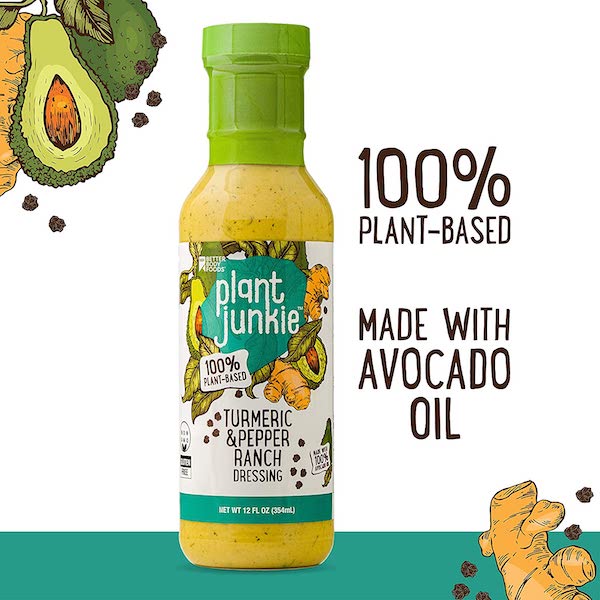 A jar of salad dressing with avocado drawings from Awesome New Products