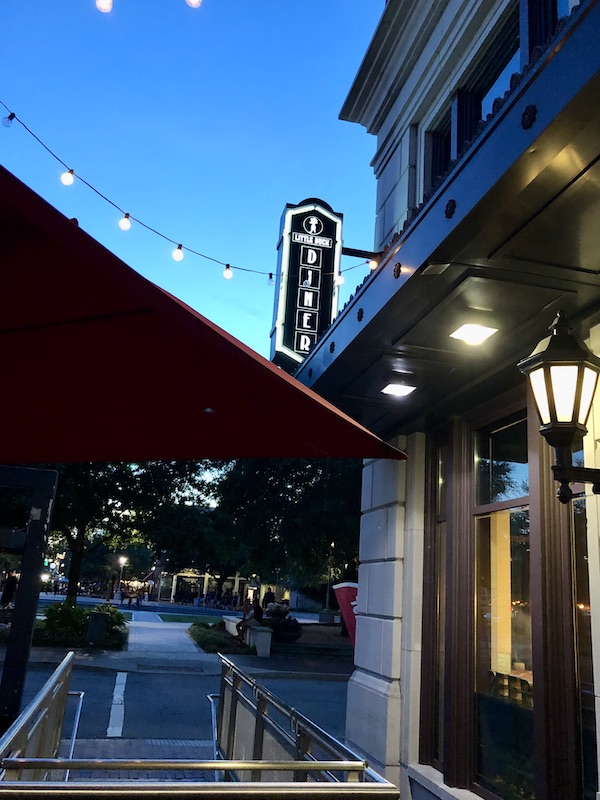 The view of a restaurant with their sign Little Duck Diner, Savannah