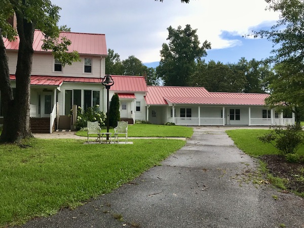 An historic white ranch house in Chesapeake Virginia