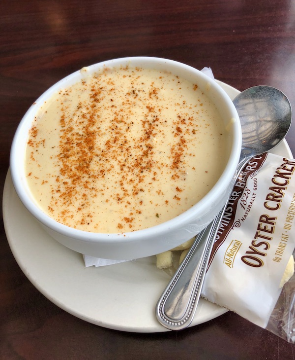 A bowl of creamy soup with red seasoning in Chesapeake Virginia
