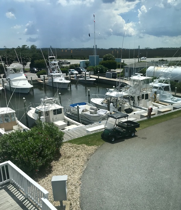 A marina with large sport fishing boats in OBX Outer Banks North Carolina