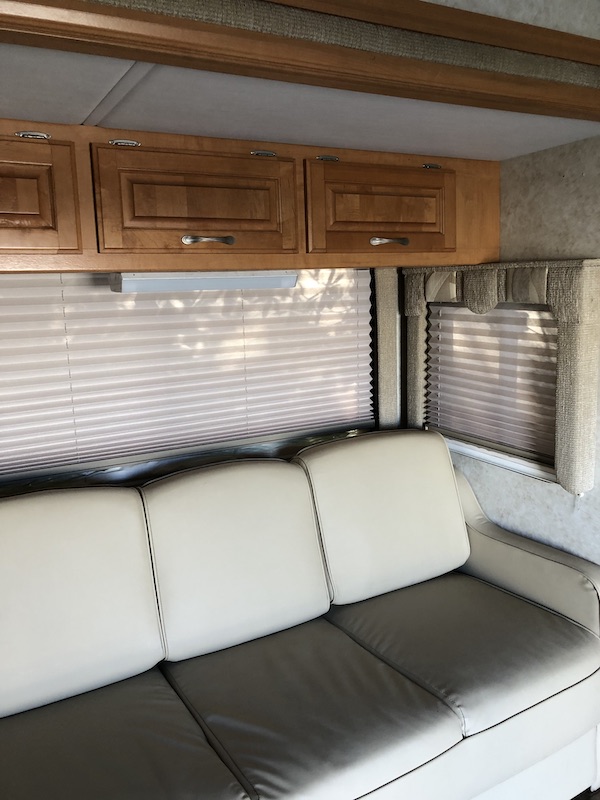 An RV living room sofa from RV Renovations Complete The Big Reveal