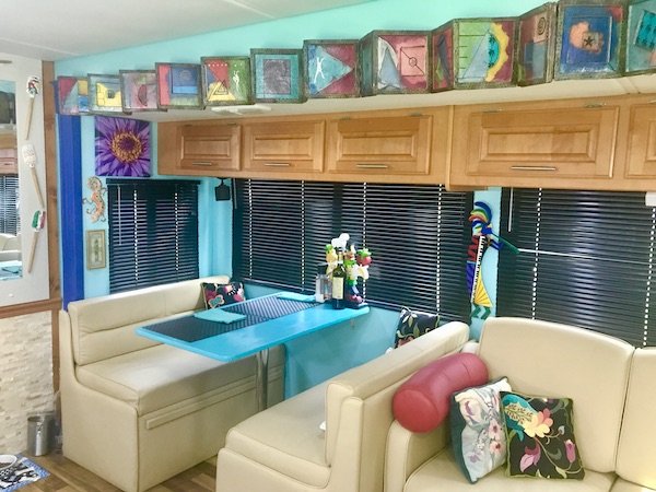 A cheerful sofa and RV dinette from RV Renovations Complete The Big Reveal
