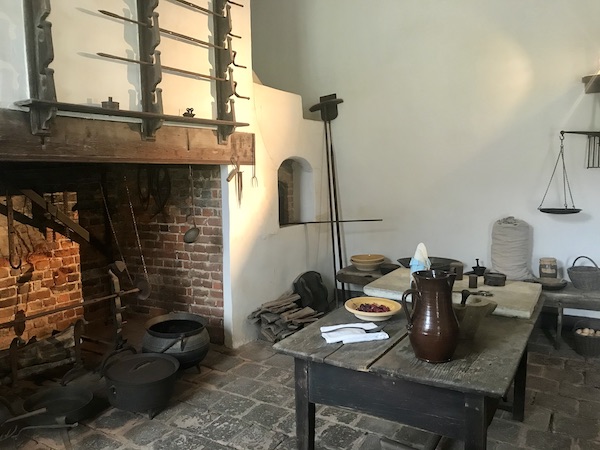 A fireplace for cooking and a work table at George Washington's Mount Vernon