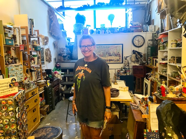A female artist at her studio at The Torpedo Factory Alexandria Virginia