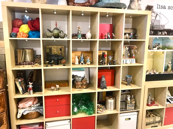 A pale yellow display of ceramic art at The Torpedo Factory Alexandria Virginia