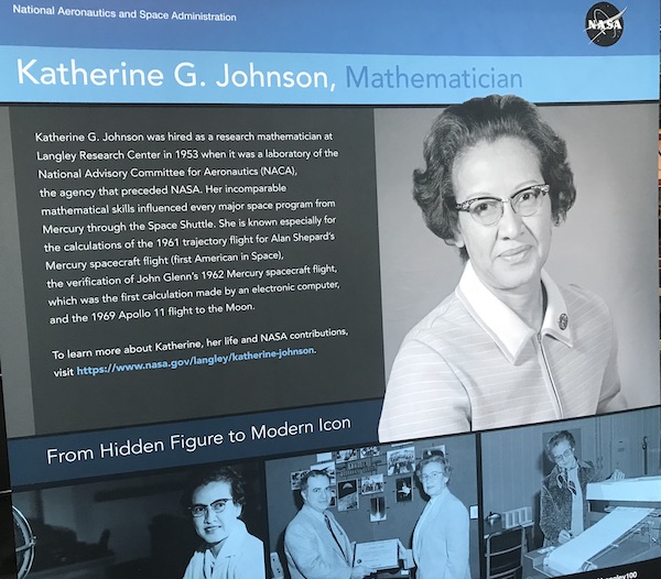 An information board with a photo of the woman who inspired the movie Hidden Figures at Virginia Air and Space Center