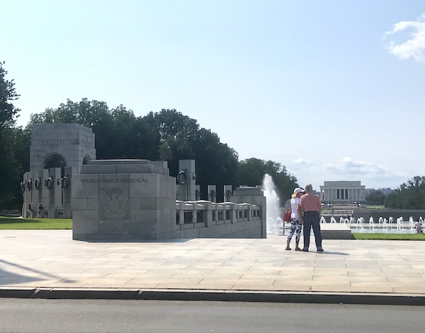 Two memorials with a couple of tourists in Washington DC and Annapolis Maryland