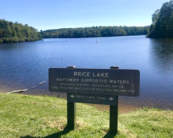 A large lake with boats along the Blue Ridge Parkway NC