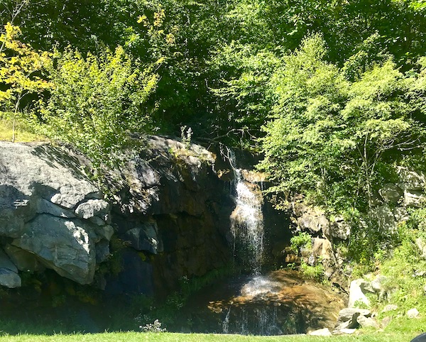 Rocks, a waterfall and foliage along the Blue Ridge Parkway NC