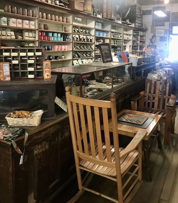 A pair of chairs and a checkers board at Mast General Store
