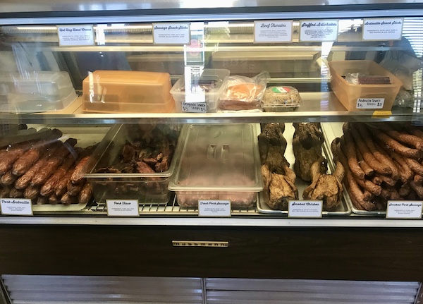 A deli case filled with cheese and sausages in LaPlace Louisiana