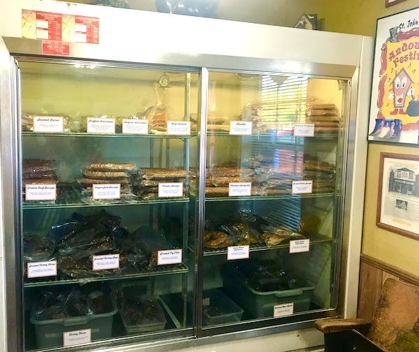 A commercial refrigerator filled with sausages in LaPlace Louisiana