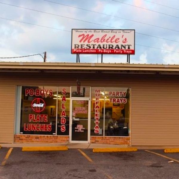 The front of tan colored building that houses Mabile's Restaurant in LaPlace Louisiana