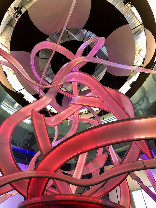 Pink and rose colored lit ribbons change colors to the music at Mississippi Civil Rights Museum