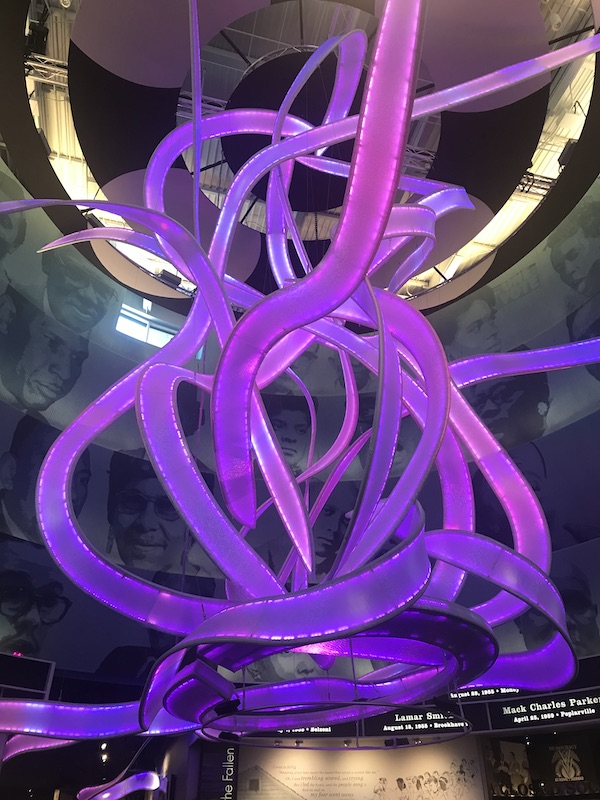 A sculpture that appears to be purple ribbons at the Mississippi Civil Rights Museum