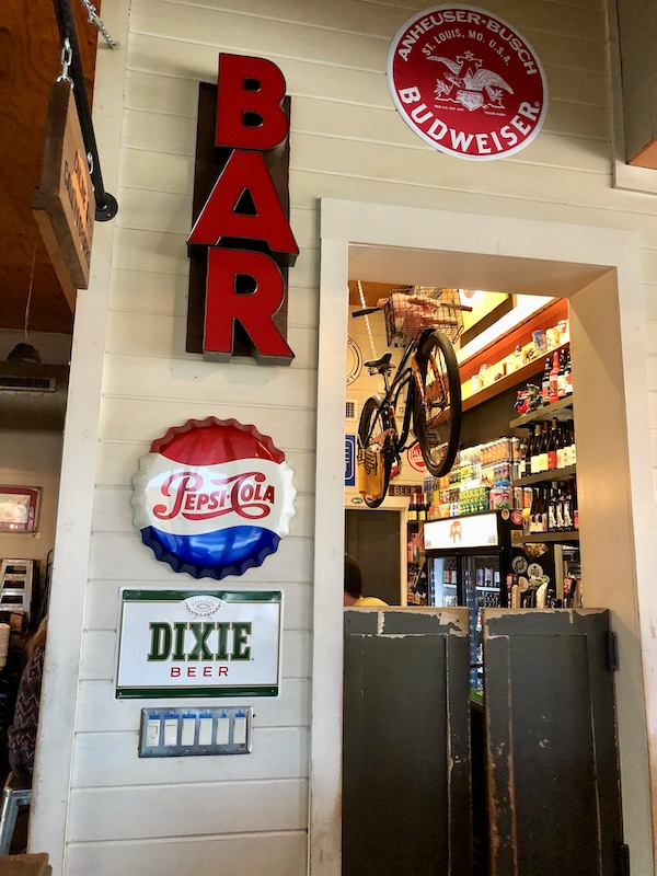 An entry wall displaying cool memorabilia at a BBQ restaurant near the Mississippi Civil Rights Museum