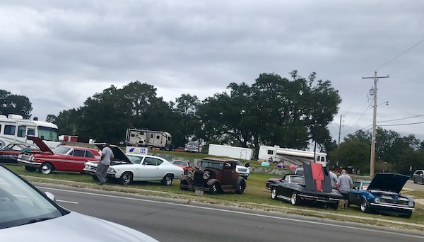 Old cars on display and parked RVs along our drive from NOLA to Biloxi
