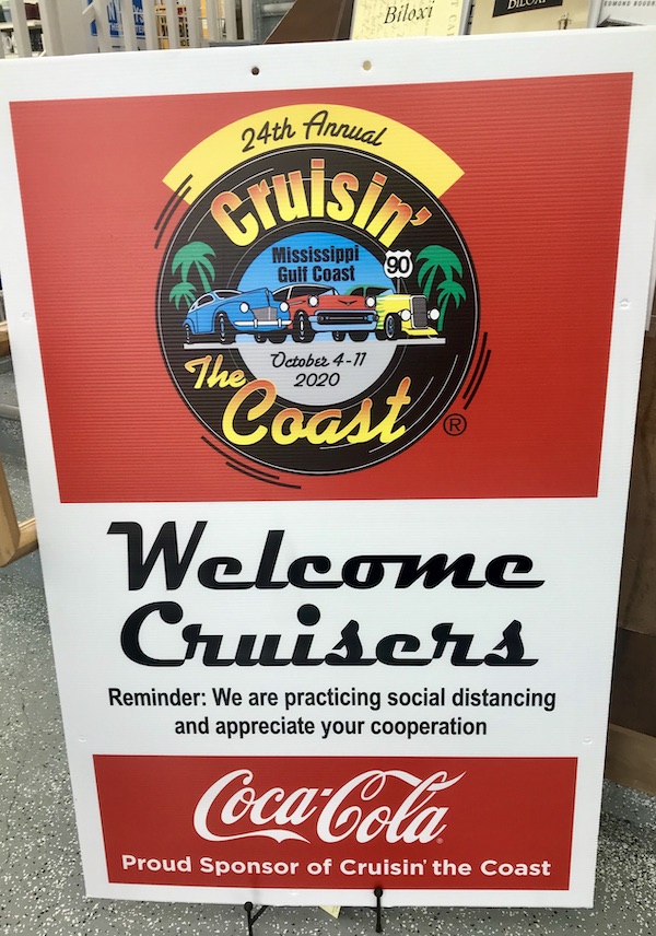 A red, white and yellow sign welcoming cruisers along our drive from NOLA to Biloxi