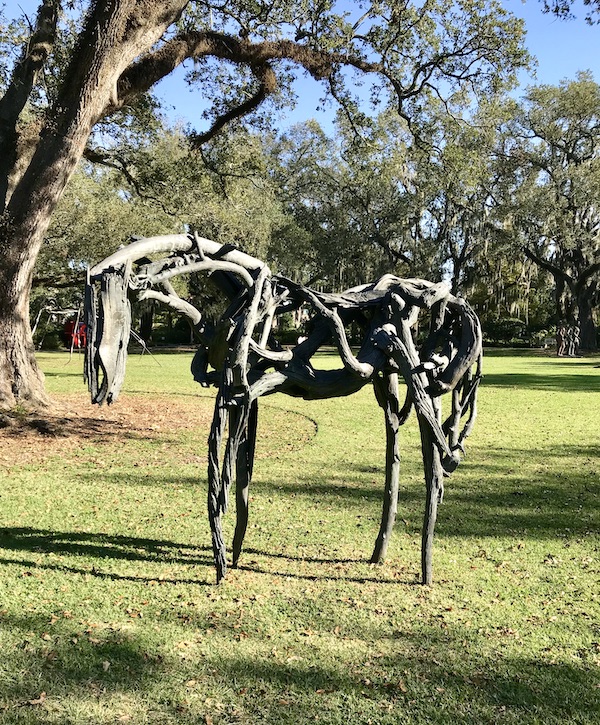 A bronze horse sculpture on the lawn at the Bestoff Sculpture Garden