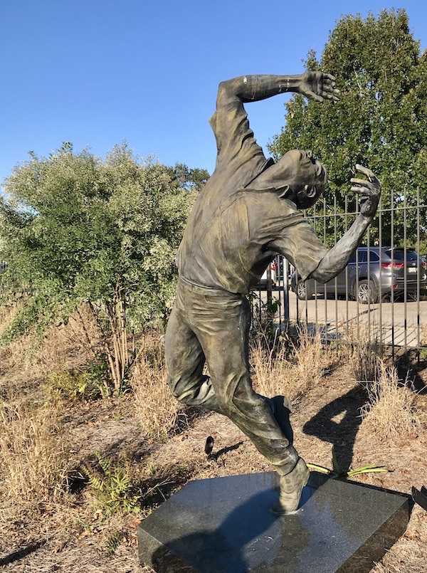 A bronze male sculpture