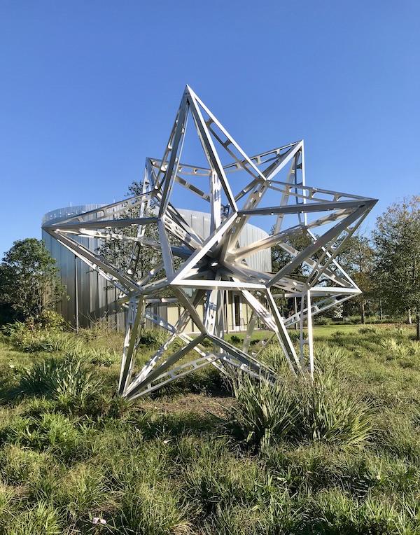 An aluminum star sculpture at the Bestoff Sculpture Garden