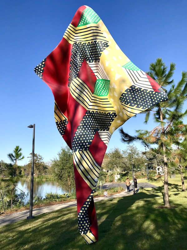 A colorful flag sculpture at the Bestoff Sculpture Garden