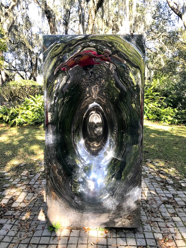 An oval steel sculpture at the Bestoff Sculpture Garden