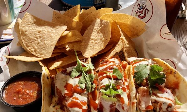 A trio of tuna tacos, salsa and tortilla chips at a restaurant on Galveston Island Texas