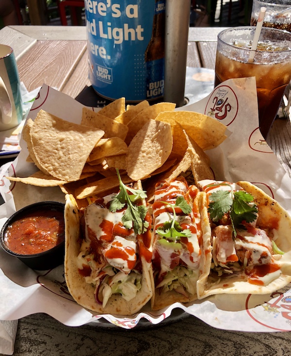 A trio of tuna tacos, salsa and tortilla chips at a restaurant on Galveston Island Texas