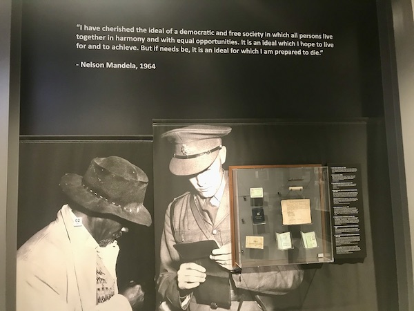 A photo of Nelson Mandela and a soldier at the Holocaust Museum Houston