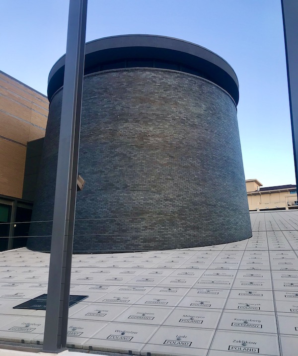A black round chimney at the Holocaust Museum Houston