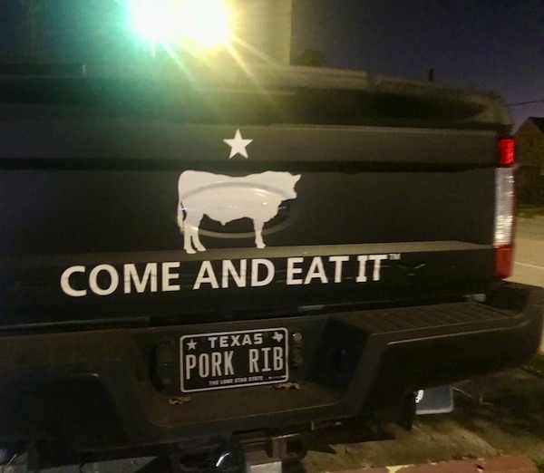 The back of a black truck near Holocaust Museum Houston