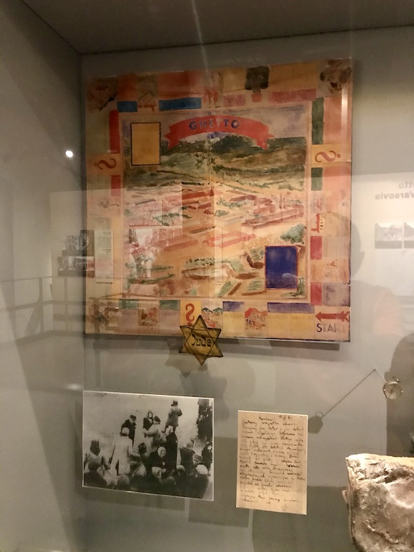 A monopoly board prototype in a glass case at the Holocaust Museum Houston