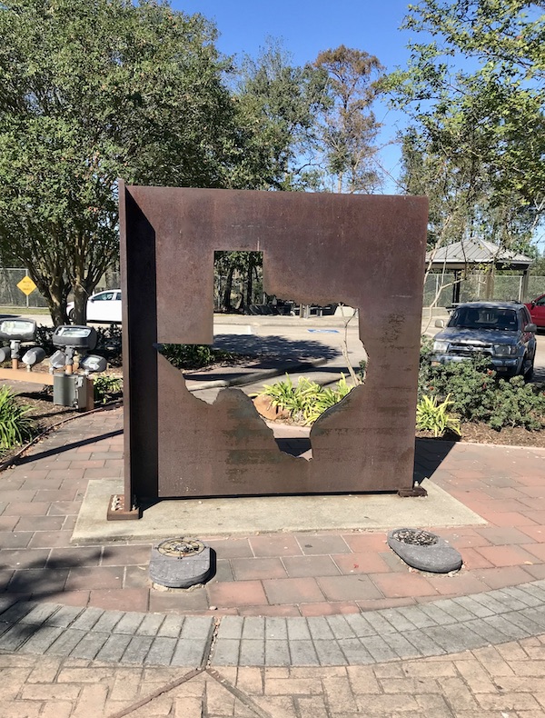 Texas at Last! and a sculpture of the state of Texas/