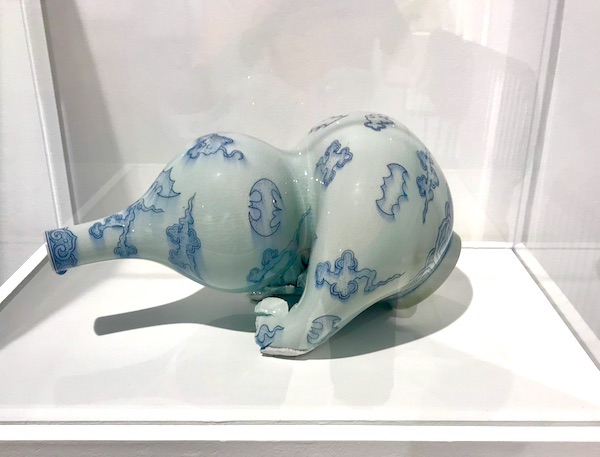 A gray and blue vase on display at The Houston Center for Contemporary Craft