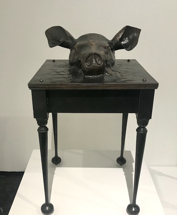 A pig's head forged into at table at The Houston Center for Contemporary Craft