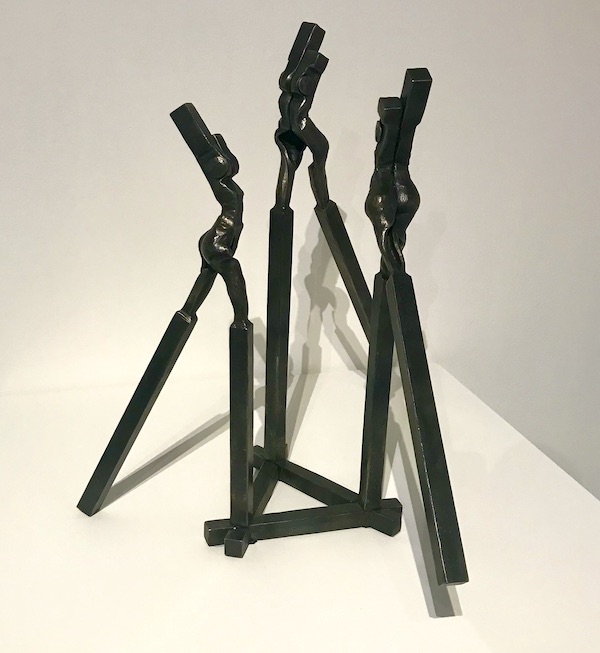 3 black iron stick figures at The Houston Center for Contemporary Craft