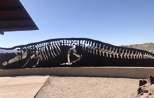A black metal sculpture of a dinosaur at Big Bend National Park Texas