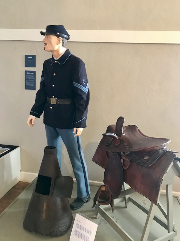 A Fort Stockton Texas soldier mannequin with his saddle and weapon.